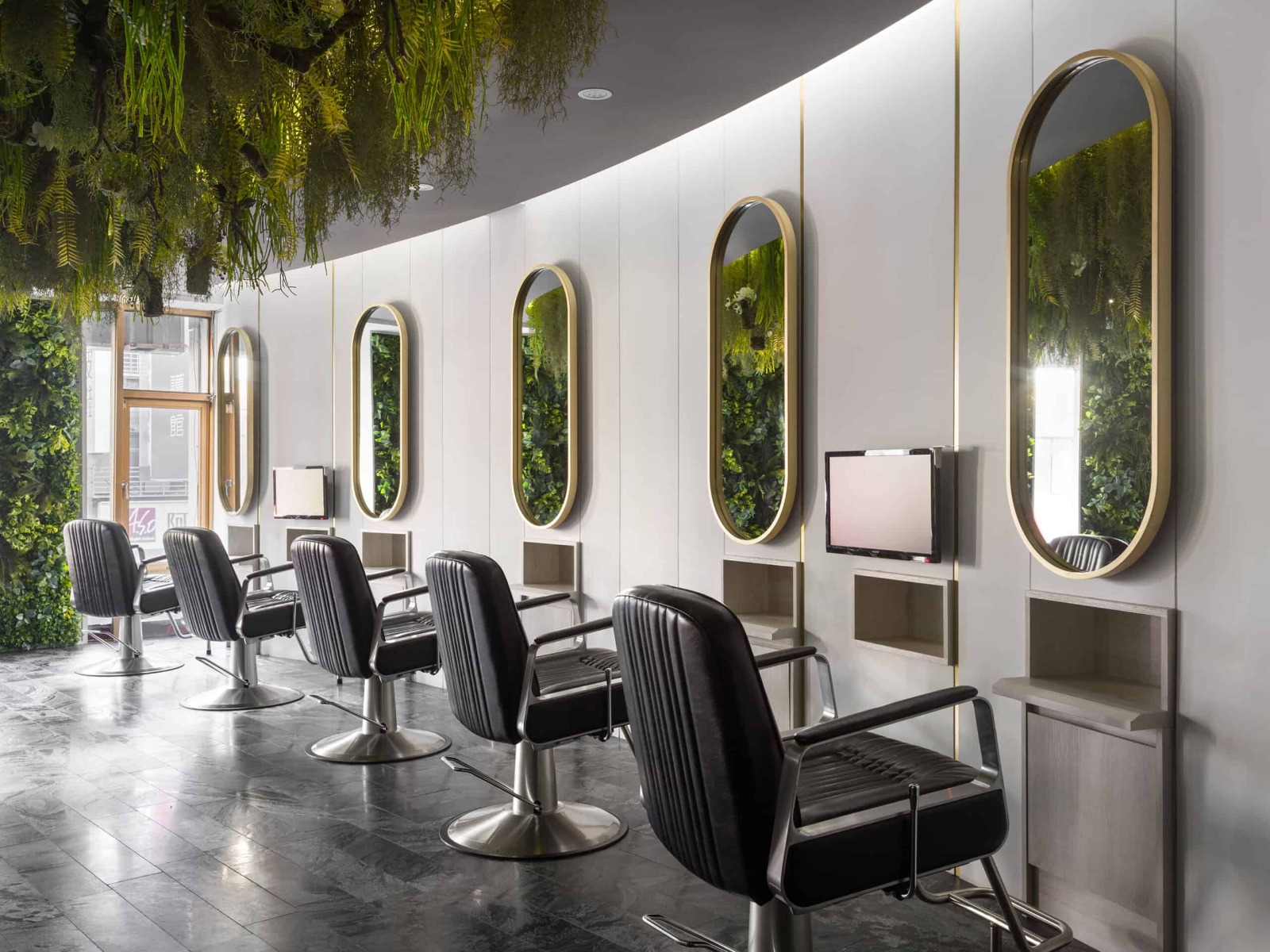 hair-stylist-stations-in-green-modern-salon-scaled.jpg